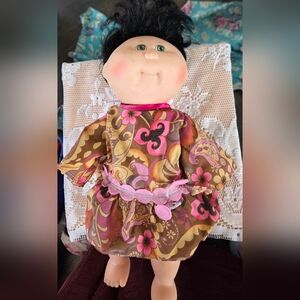 Floral Patterned Doll with Pink and Brown Dress